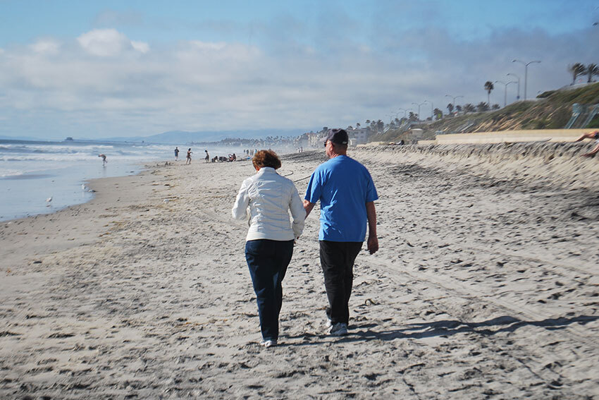 Senior-walking-by-the-beach